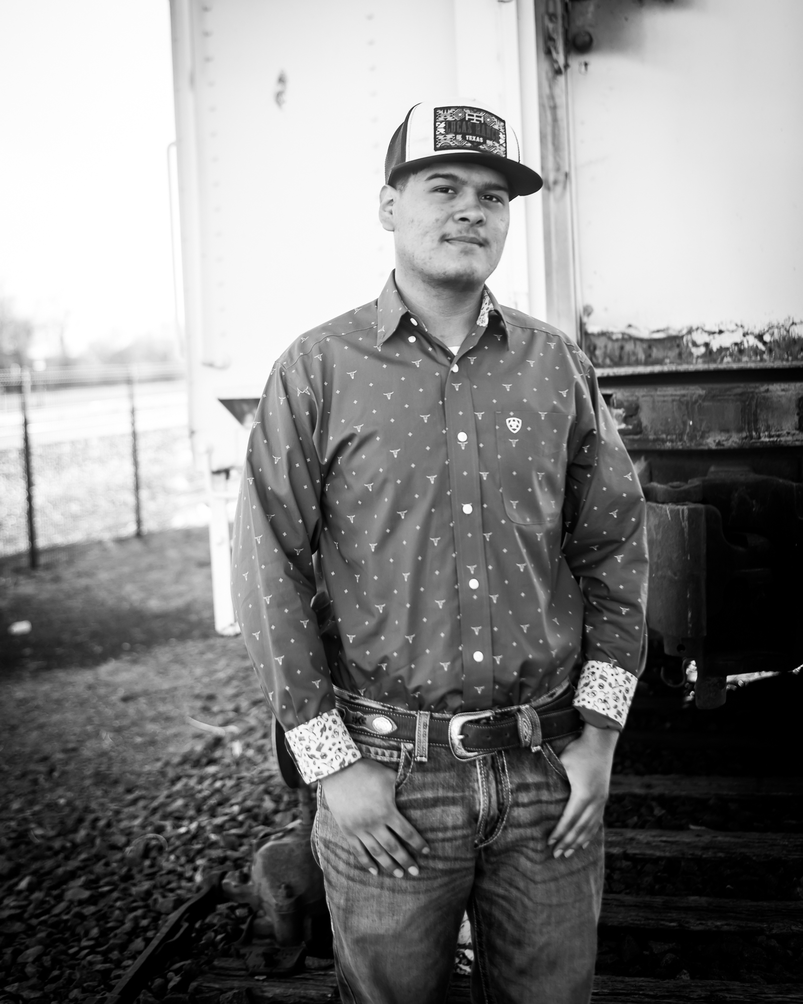 black and white photo of a gentleman on a farm